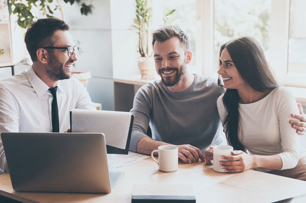 Mortgage adviser in Chester with young couple